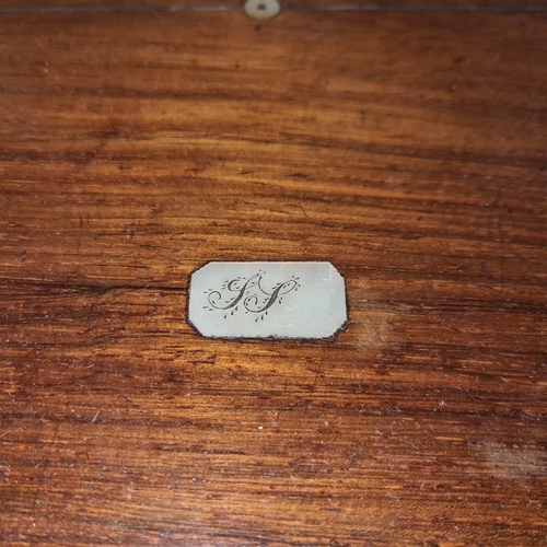 147 - A charming antique wooden jewellery box featuring inlay and Mother of Pearl marquetry to top and sil... 