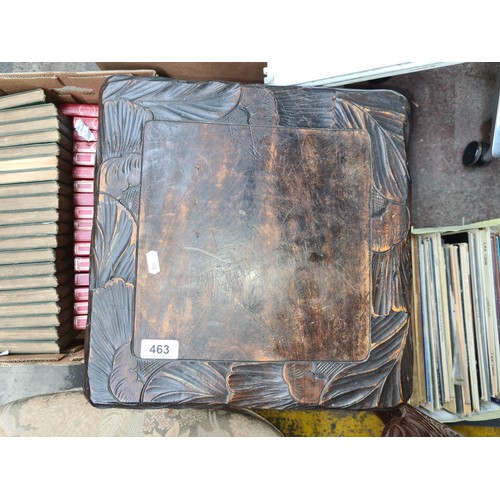 463 - A nicely sized hand carved ebonized wood side table