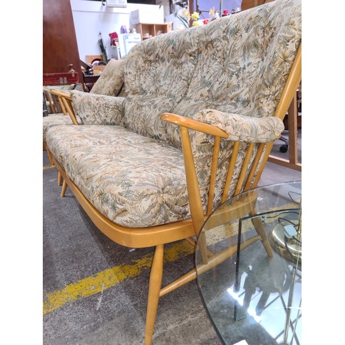 500 - Star Lot : A fabulous original Ercol mid century furniture suite. Includes two seater sofa, armchair... 