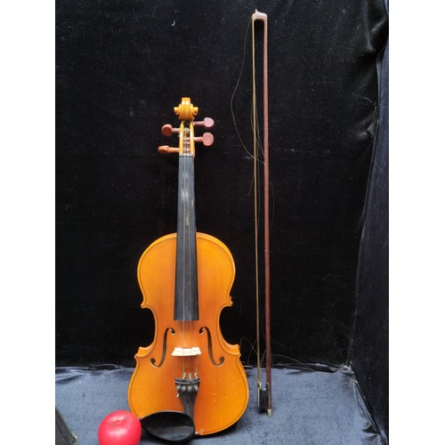 995 - A Swedish made Prim E (mi ) Precision-String violin in medium tone. In original carry case