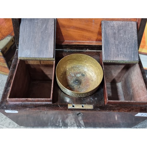 173 - Star Lot : A gorgeous antique walnut tea caddy featuring an intricately engraved brass measure bowl.... 