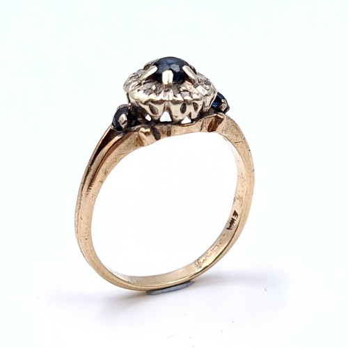 1 - A nine carat gold (375)  sapphire stone ring. Ring size - J. Weight - 2.5 grams. Boxed.