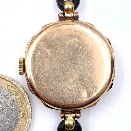 42 - Super Star Lot : A fine 9 carat gold ladies Rolex genuine wrist watch set with enamelled face Arabic... 