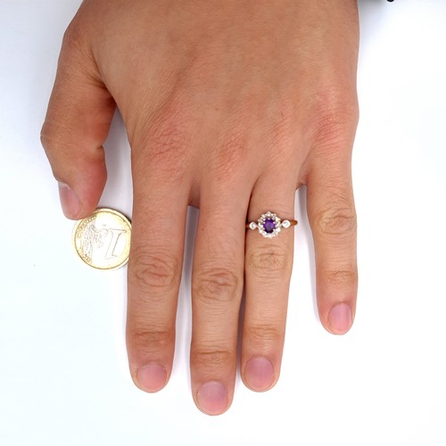 2 - Star lot : A pretty amethyst and Diamond ring mount set in nine carat gold (375). Ring size - L 1/2.... 