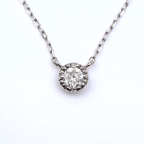 50 - Star Lot : A beautiful diamond pendant marked diamond to reverse. Together with chain marked 10K. Le... 