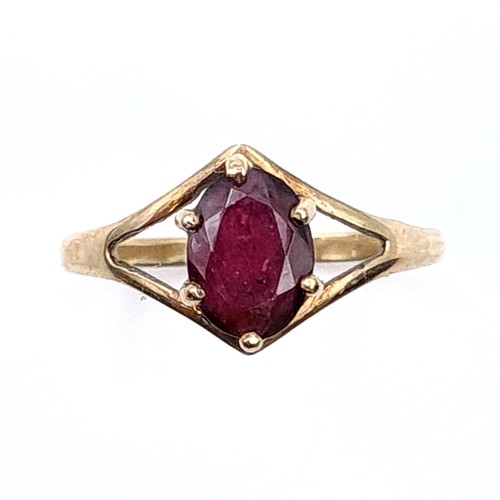 56 - A garnet stone ring set in a claw mount marked nine carat gold (375). Ring size - P. Weight - 1.65 g... 