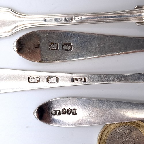 503 - A collection of four assorted Irish silver teaspoons (Dates indistinct). Total weight - 64.14 grams.