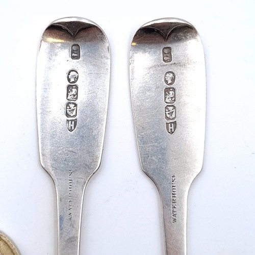 504 - Two Irish silver teaspoons dated 1818. Length - 15 cms. Weight - 54.84 grams.