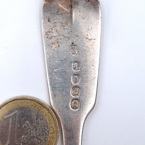 505 - A sterling silver dinner spoon hallmarked London - 1819. Length - 18 cms. Weight - 46.3 grams.