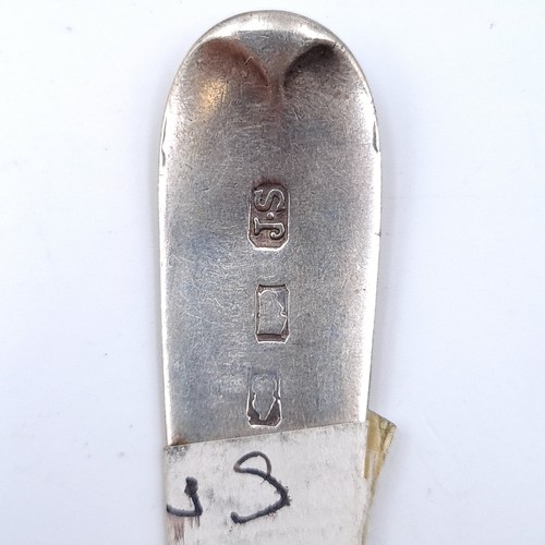 506 - A large Irish silver dessert spoon. Date marks indistinct. Length - 17 cms. Weight - 22.74 grams.