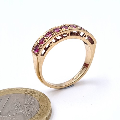 9 - Star Lot : A very pretty nine stone ruby half eternity ring set in nine carat gold (375) Ring size -... 