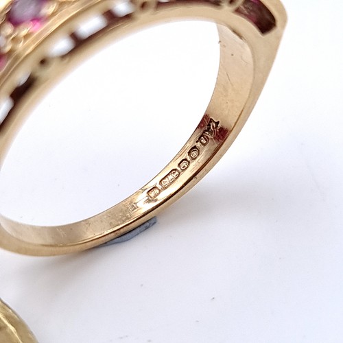 9 - Star Lot : A very pretty nine stone ruby half eternity ring set in nine carat gold (375) Ring size -... 