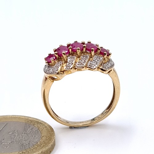 10 - Star Lot : A fabulous example of a five stone large ruby ring with channel set diamond mount set in ... 