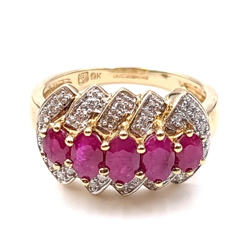 10 - Star Lot : A fabulous example of a five stone large ruby ring with channel set diamond mount set in ... 