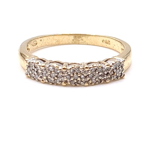 11 - Star Lot : A most attractive 18 carat gold (750) diamond set half eternity ring. Ring size - O. Weig... 