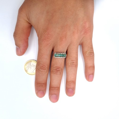 12 - Super Star Lot : An amazing five stone emerald set diamond ring (Stamp to band) set in nine carat go... 