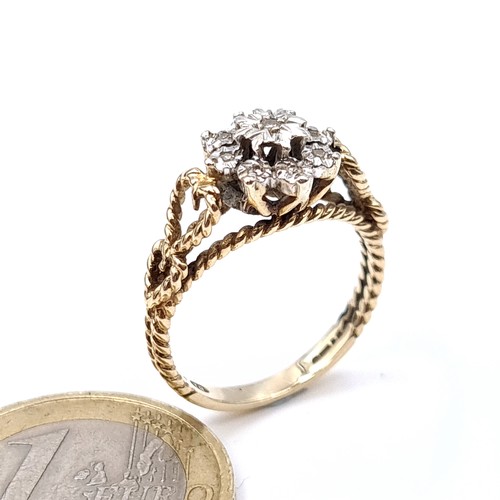 14 - Star Lot : A very attractive vintage 1950s nine carat gold illusion set diamond cluster ring with at... 