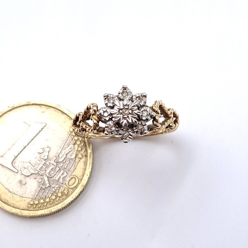 14 - Star Lot : A very attractive vintage 1950s nine carat gold illusion set diamond cluster ring with at... 