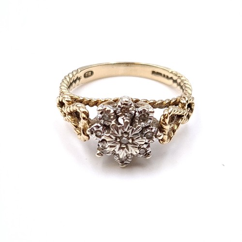 14 - Star Lot : A very attractive vintage 1950s nine carat gold illusion set diamond cluster ring with at... 