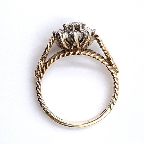 14 - Star Lot : A very attractive vintage 1950s nine carat gold illusion set diamond cluster ring with at... 