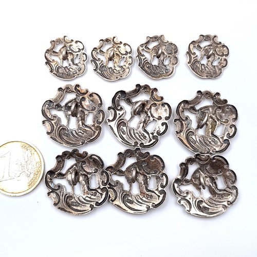 16 - A collection of Antique Sterling Silver Fortuna buttons consisting of six large and 4 smaller exampl... 