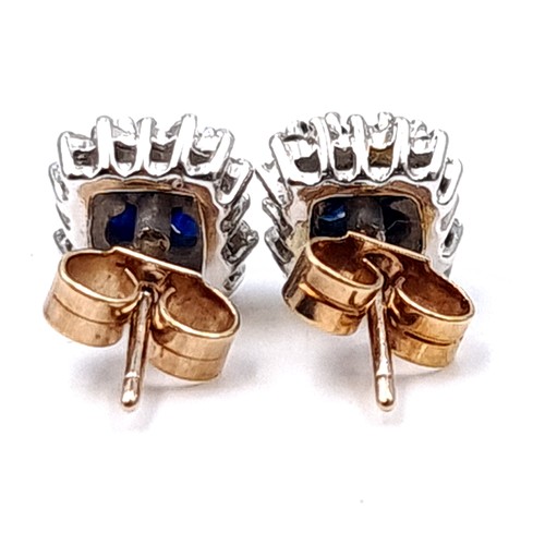 17 - Star Lot : A pair of nine carat gold Sapphire and diamond stud earrings. Total weight - 2 grams. Box... 