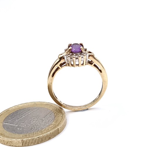 20 - Star Lot : A pretty amethyst and Diamond ring set in nine carat gold (375) with gemstone surround. R... 