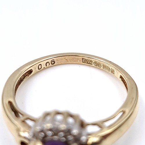 20 - Star Lot : A pretty amethyst and Diamond ring set in nine carat gold (375) with gemstone surround. R... 