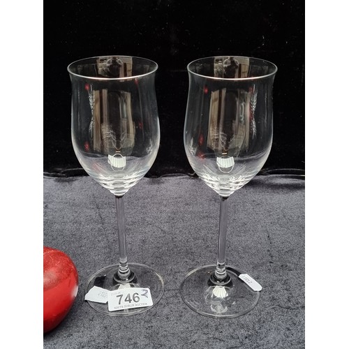 746 - A pair of Marquis by Waterford crystal wine glasses.