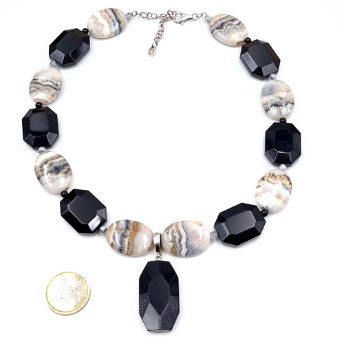 1005 - A lovey Designer Whitney Kelly cold to the touch sterling silver bracelet. With Black onyx.