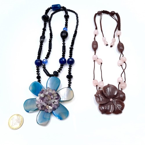 951 - Two  multi gemstone flower mounted necklaces. Lengths -  42 & 70 cms. All cold to the touch and very... 