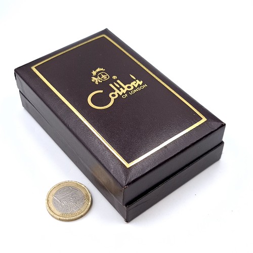 29 - A calibre gold metal engine turned lighter in original calibri presentation box.