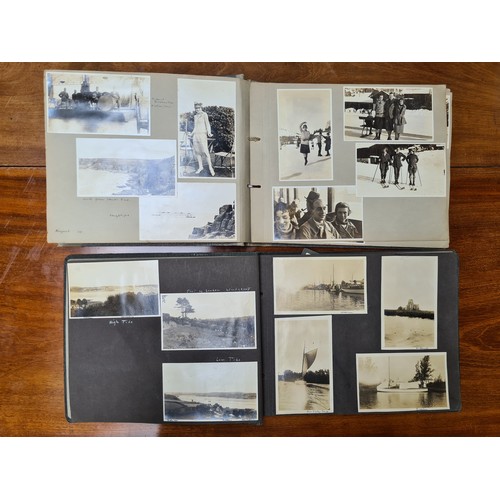 143 - Two fabulous early 20th century c. 1920s filled photo albums with brief inscriptions of names and pl... 