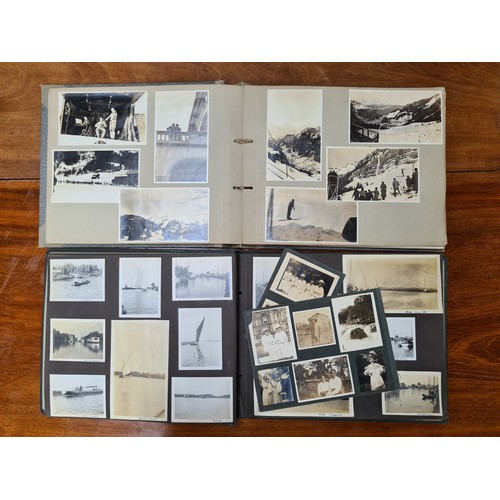 143 - Two fabulous early 20th century c. 1920s filled photo albums with brief inscriptions of names and pl... 