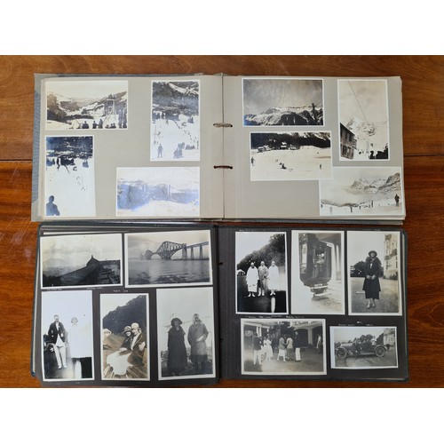 143 - Two fabulous early 20th century c. 1920s filled photo albums with brief inscriptions of names and pl... 