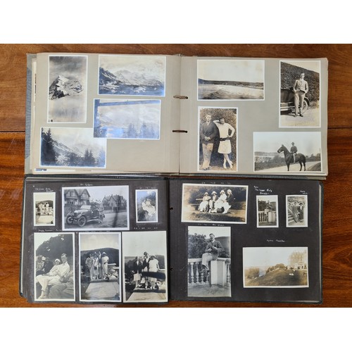 143 - Two fabulous early 20th century c. 1920s filled photo albums with brief inscriptions of names and pl... 