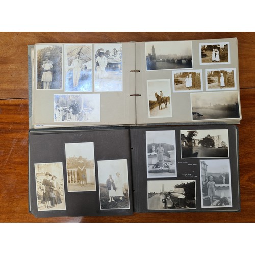 143 - Two fabulous early 20th century c. 1920s filled photo albums with brief inscriptions of names and pl... 