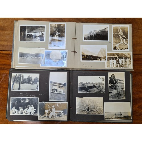 143 - Two fabulous early 20th century c. 1920s filled photo albums with brief inscriptions of names and pl... 