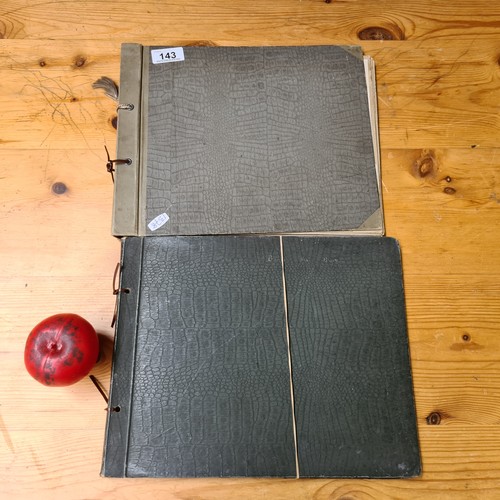 143 - Two fabulous early 20th century c. 1920s filled photo albums with brief inscriptions of names and pl... 