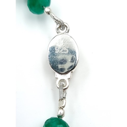 968 - Star Lot : A super example of a graduated emerald gemstone necklace with a ruby stone set clasp set ... 