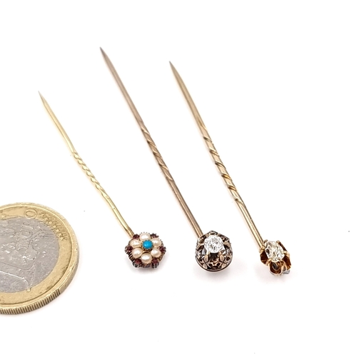 14 - A nice collection of stick pins. The first a diamond set example. Est. weight of diamond - 0.3 carat... 