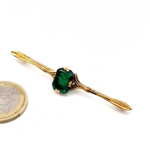 15 - A nice example of a nine carat gold green tourmaline gem set brooch. Length - 6.5 cms. Weight - 2.8 ... 