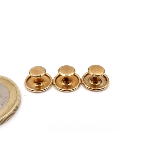 37 - A set of three nine carat gold collar studs. Total weight - 1.8 grams. Boxed.