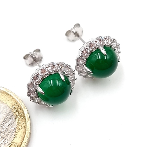 43 - A stunning  pair of cabochon lab created Dark Emerald  stud earrings set in sterling silver with gem... 