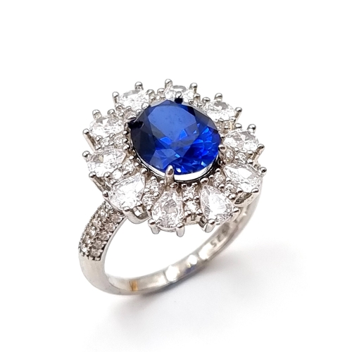 49 - A stunning lab created huge Sapphire and gem set statement ring with gemstone surround. Ring size - ... 