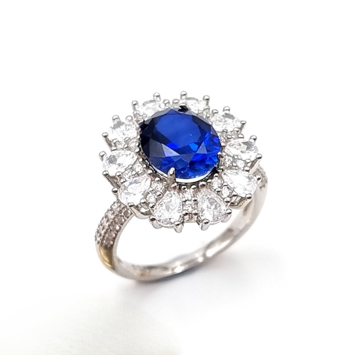 50 - A stunning lab created huge Sapphire and gem set statement ring with gemstone surround. Ring size - ... 