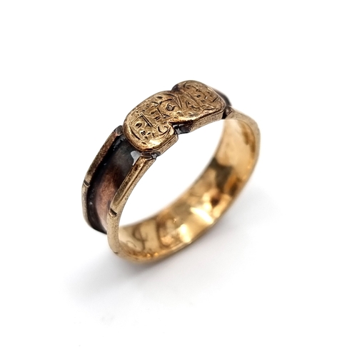 6 - A nine carat gold gents ring initiated J.O. to inner band set with burnished channel. Ring set with ... 