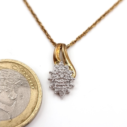 7 - Star Lot : A very pretty diamond set pendant and chain hallmarked nine carat gold. Length of chain -... 