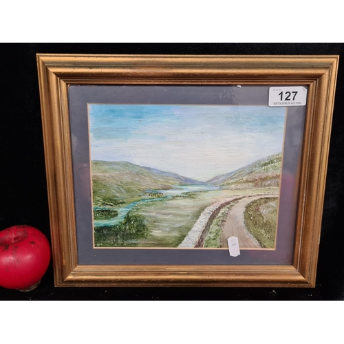 127 - A charming original oil on board painting featuring a peaceful landscape scene with meandering water... 