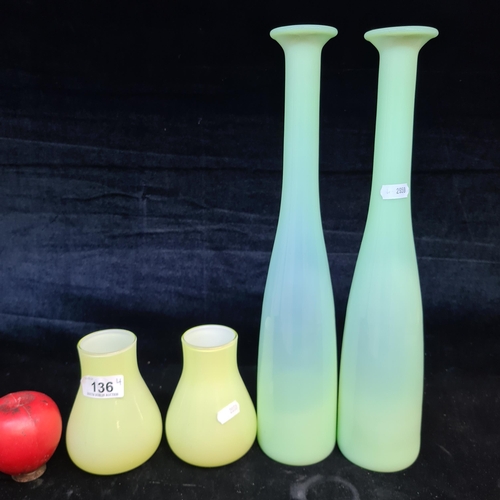 136 - Four very pretty Opaline vases in two different shades of green. Includes two tall examples and two ... 